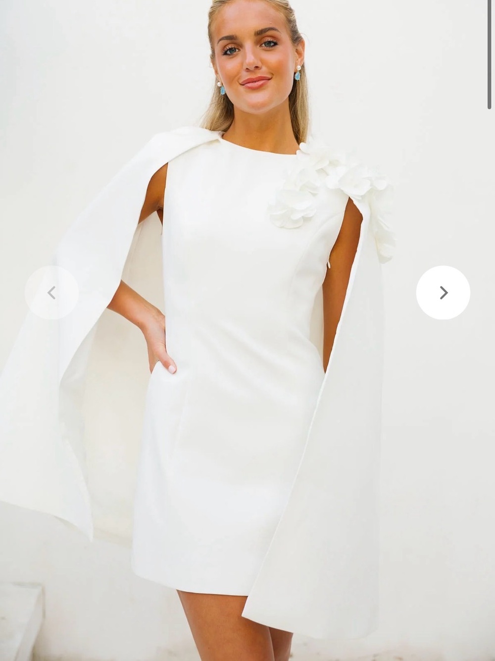 White Cape-Style Mini Dress with Floral Shoulder Detail